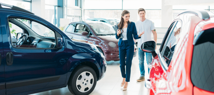 saleswoman-in-car-showroom