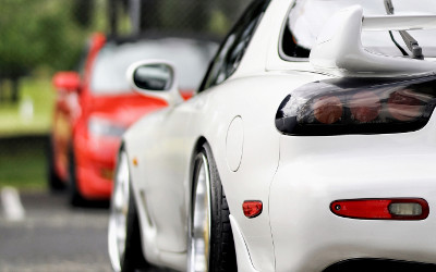 White Mazda RX7 with japanese import car insurance